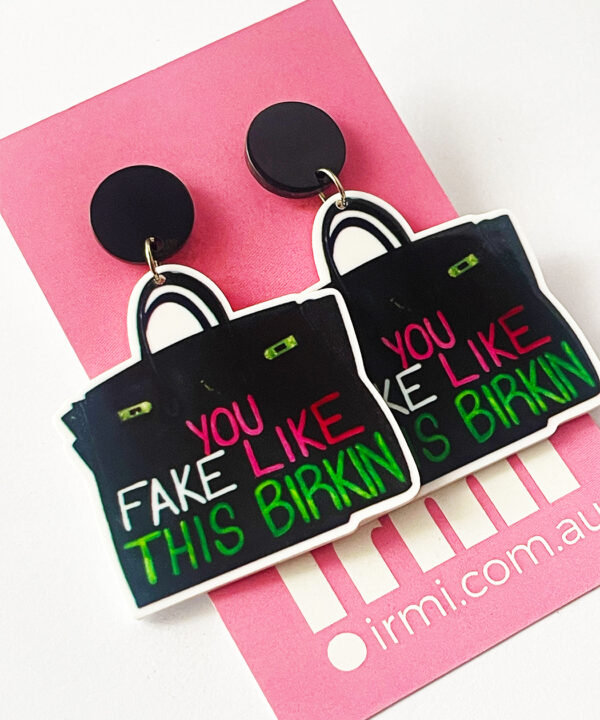 Turn heads with these playful and stylish earrings, designed to resemble miniature fake Birkin bags.