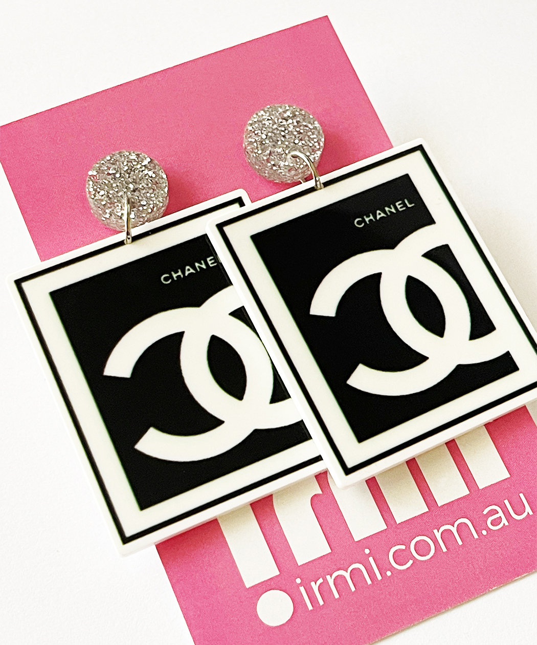 These Chanel CC-inspired earrings capture the essence of timeless luxury and sophisticated style.