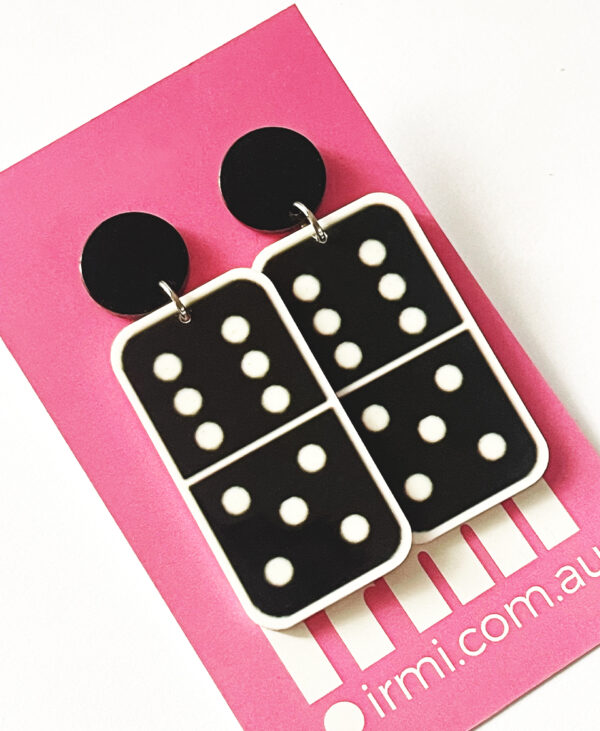 Add a touch of playful elegance to your accessory collection with these domino-shaped earrings.