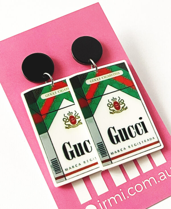 Step into a world of high fashion with these edgy, Gucci-inspired earrings, crafted to resemble the sleek and rebellious look of a designer cigarette packet.