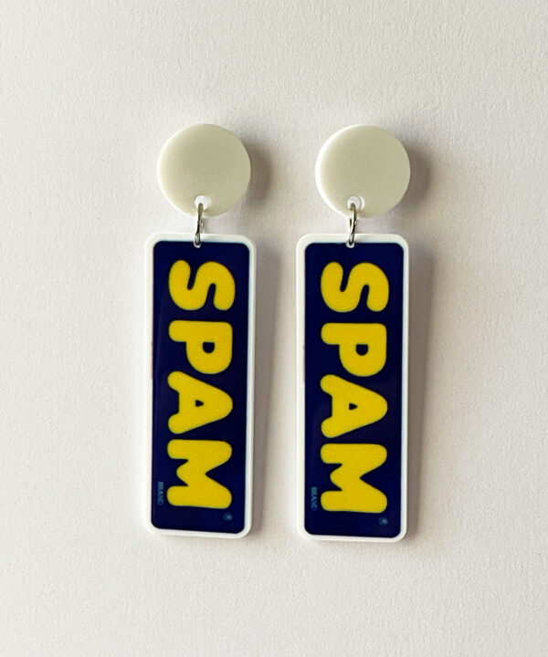Add a quirky, retro touch to your style with these playful earrings featuring the iconic Spam logo!