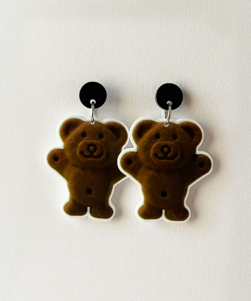 Indulge in a sweet, nostalgic treat with these Very Much Loved Tiny Teddy Biscuits inspired earrings!